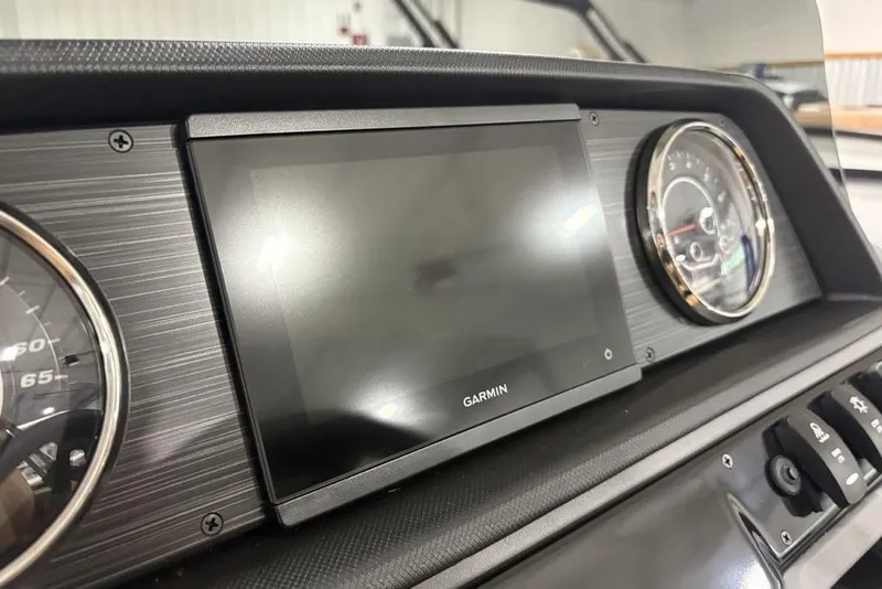 Slide: The Image of Dashboard of 2025 Godfrey Sweetwater 2286 SFL with Garmin display and gauges. - 23