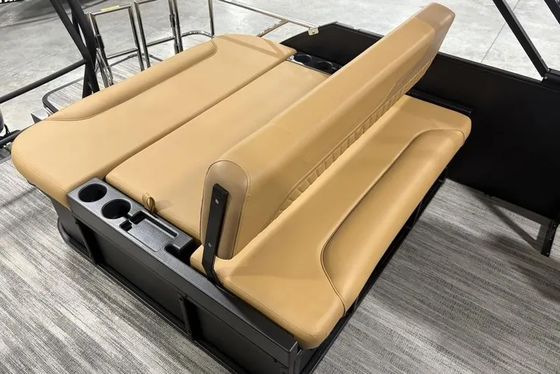 Slide: The Image of Tan seating on 2025 Godfrey Sweetwater 2286 SFL iMPACT pontoon boat, featuring cup holders. - 27