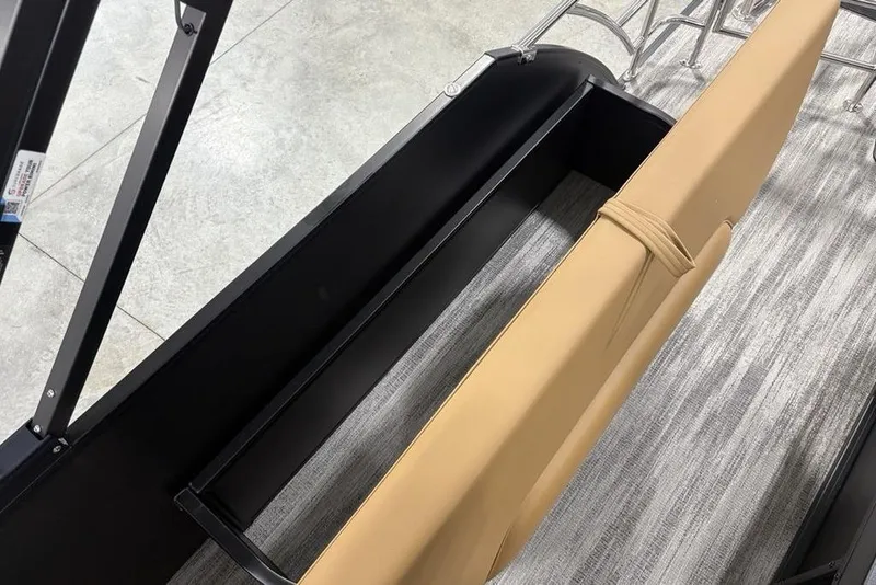 Slide: The Image of 2025 Godfrey Sweetwater 2286 SFL iMPACT boat interior with tan seating and sleek design. - 31