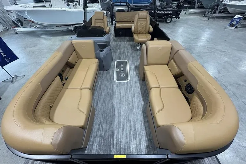 Slide: The Image of 2025 Godfrey Sweetwater 2286 SFL iMPACT pontoon boat with tan seating and spacious layout. - 34