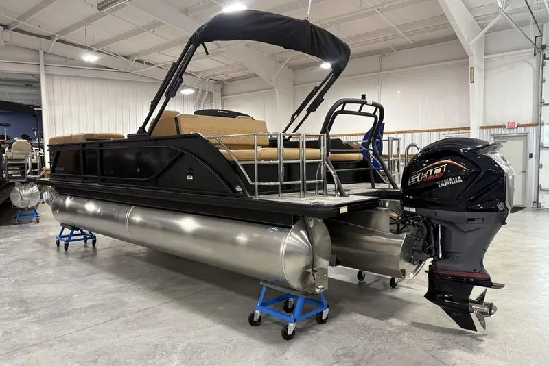 Slide: The Image of 2025 Godfrey Sweetwater 2286 SFL iMPACT pontoon boat in showroom, featuring Yamaha engine. - 5