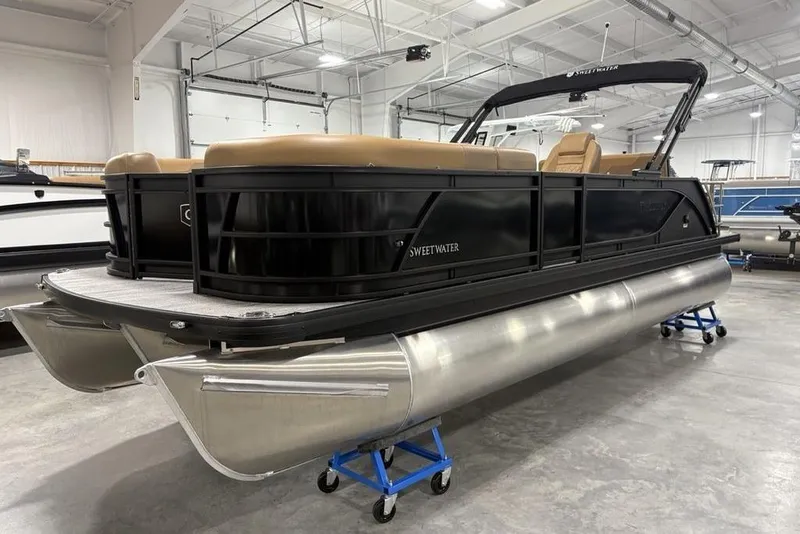 Slide: The Image of 2025 Godfrey Sweetwater 2286 SFL iMPACT pontoon boat in showroom, side view. - 6