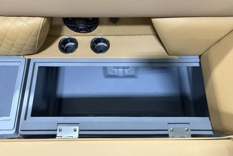 Slide: The Image of 2025 Godfrey Sweetwater 2286 SFL iMPACT Package interior storage compartment with cup holders. - 8