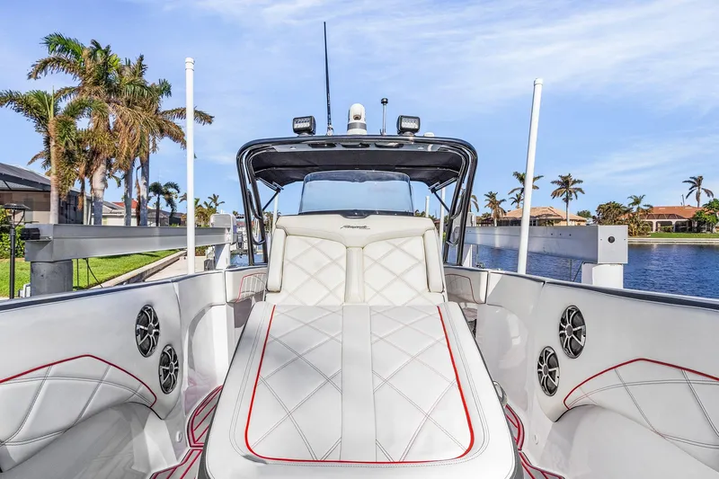 Slide: The Image of 2020 Renegade 33' Open boat interior with luxurious seating and waterfront view. - 10