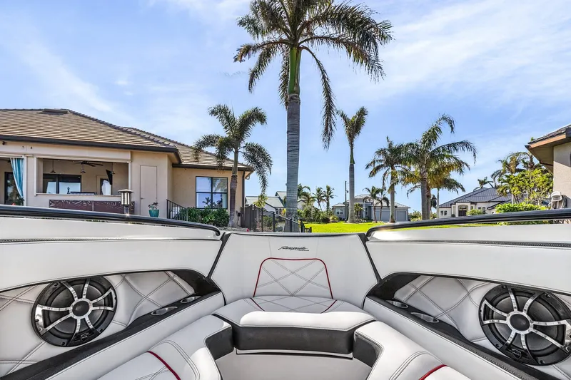 Slide: The Image of Interior view of 2020 Renegade 33' Open boat with luxurious seating and speakers. - 11