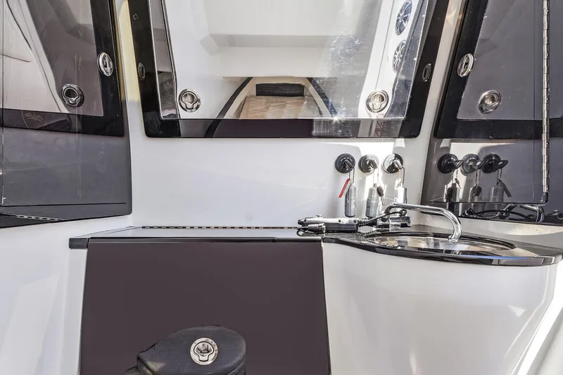 Slide: The Image of Interior view of 2020 Renegade 33' Open boat, featuring sleek design and modern controls. - 22