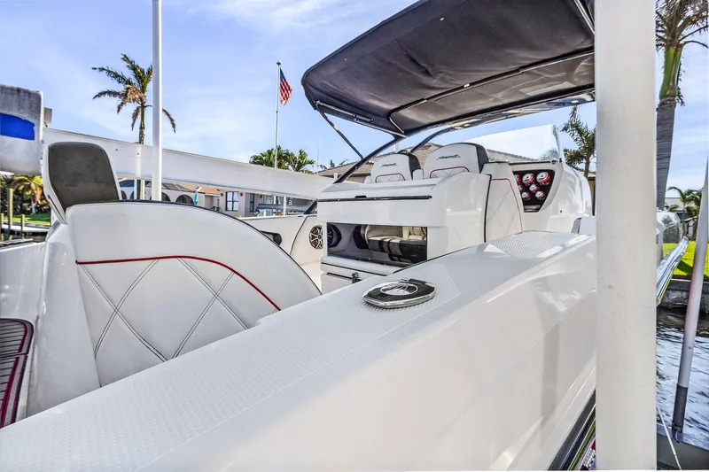Slide: The Image of 2020 Renegade 33' Open boat interior with sleek seating and modern dashboard. - 5