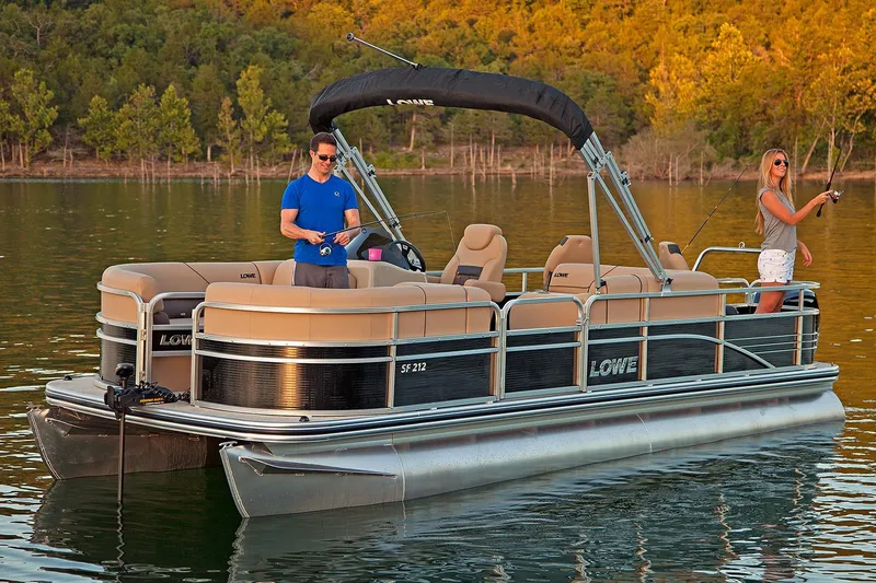 Slide: The Image of Manufacturer Provided Image: 2017 Lowe SF212 Sport Fish pontoon boat on a lake with two people fishing. - 2