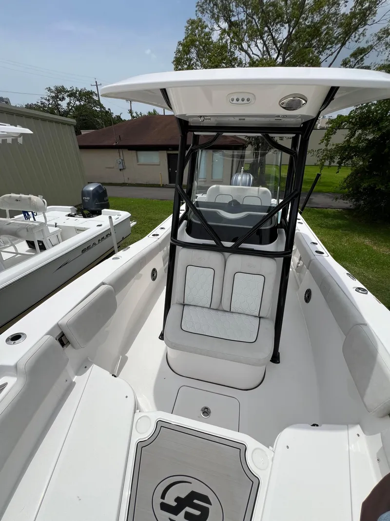 Slide: The Image of Open storage compartment on 2022 Sea Fox 248 Commander boat. - 13