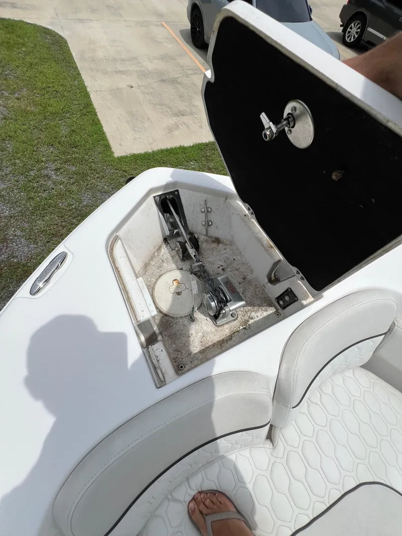 Slide: The Image of Storage compartment on a 2022 Sea Fox 248 Commander boat, containing cushions and equipment. - 14