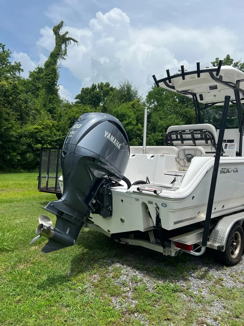 Slide: The Image of 2022 Sea Fox 248 Commander with Yamaha 300 V6 engine, rear view. - 7