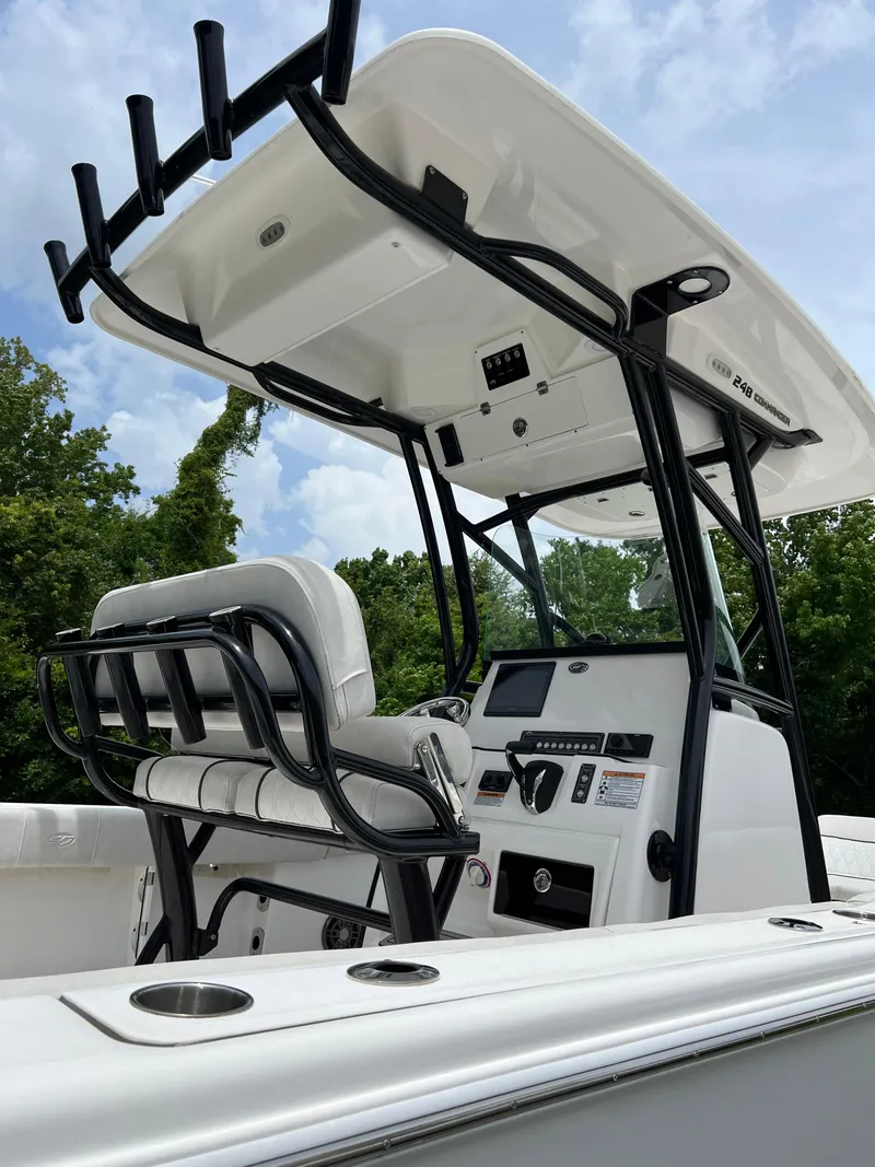Slide: The Image of 2022 Sea Fox 248 Commander boat console with steering wheel and controls. - 9