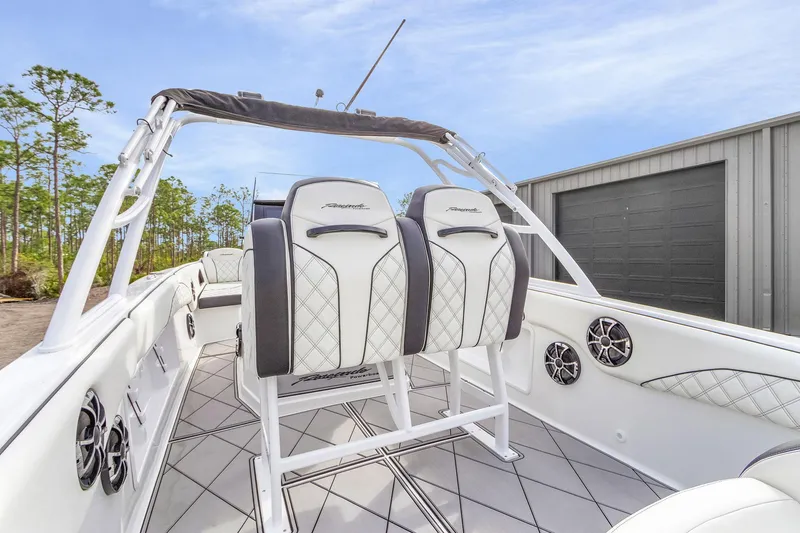 Slide: The Image of 2020 Renegade 32' Cuddy boat interior with stylish seating and modern design. - 17