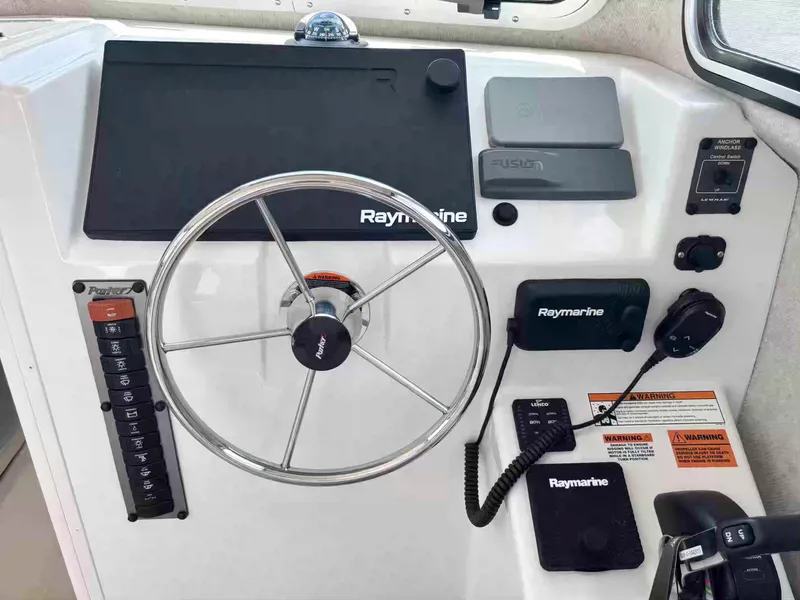 Slide: The Image of Control panel of 2021 Parker 2520 XLD Sport Cabin with Raymarine equipment. - 10