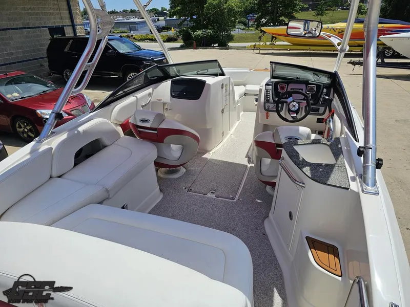 Slide: The Image of 2008 Chaparral Sunesta 224 boat interior with seating and steering console. - 40
