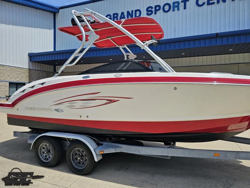 Slide: The Image of 2008 Chaparral Sunesta 224 boat with red accents on a trailer at Grand Sport Center. - 7
