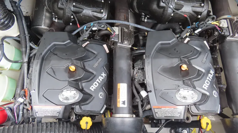 Slide: The Image of Twin Rotax engines in a 2020 Scarab 255 Open G boat. - 23