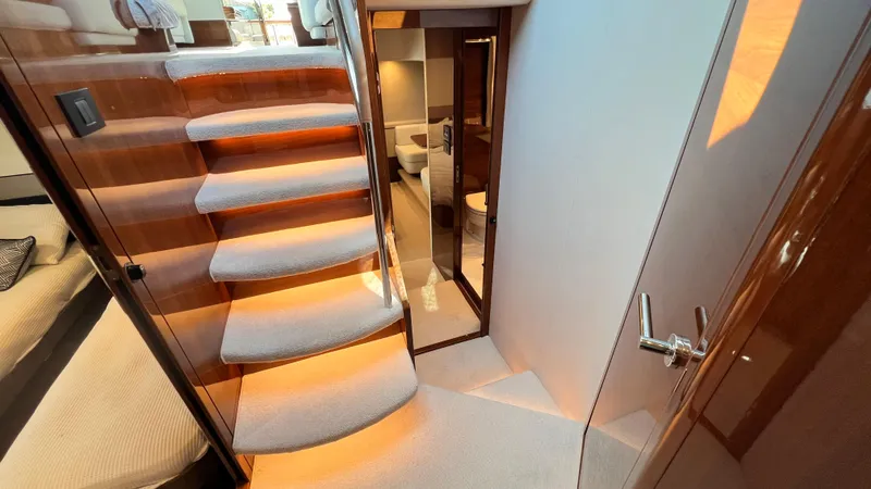 Slide: The Image of Luxurious interior of 2019 Princess F62 yacht with elegant staircase and modern design. - 18