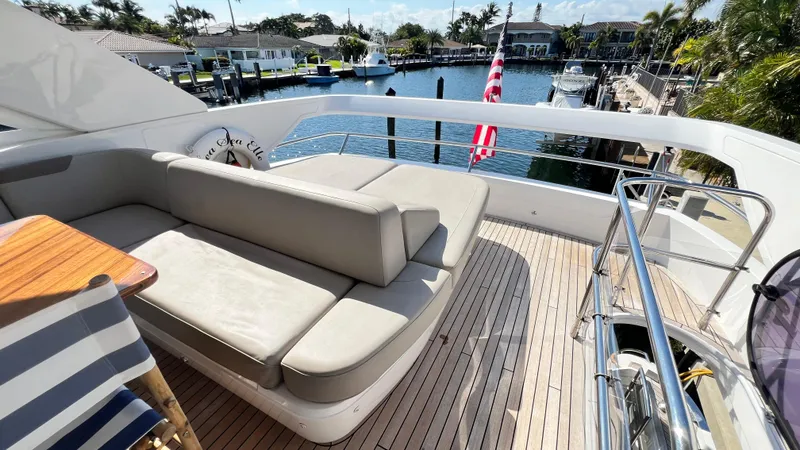 Slide: The Image of Luxurious 2019 Princess F62 yacht deck with seating, overlooking marina. - 41