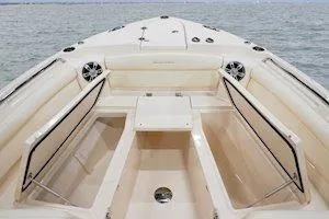 Slide: The Image of 2026 Grady-White Freedom 285 boat interior with spacious seating and storage compartments. - 9