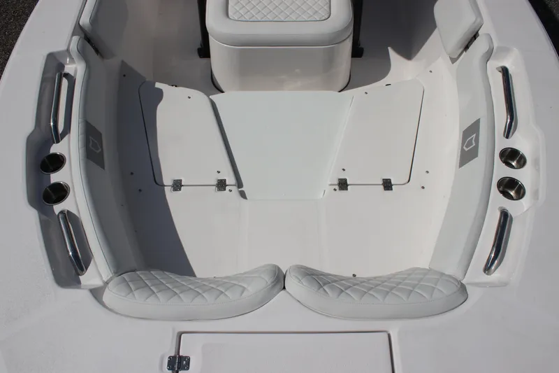 Slide: The Image of Interior view of 2026 Sea Fox 228 Commander boat with cushioned seating and storage compartments. - 11