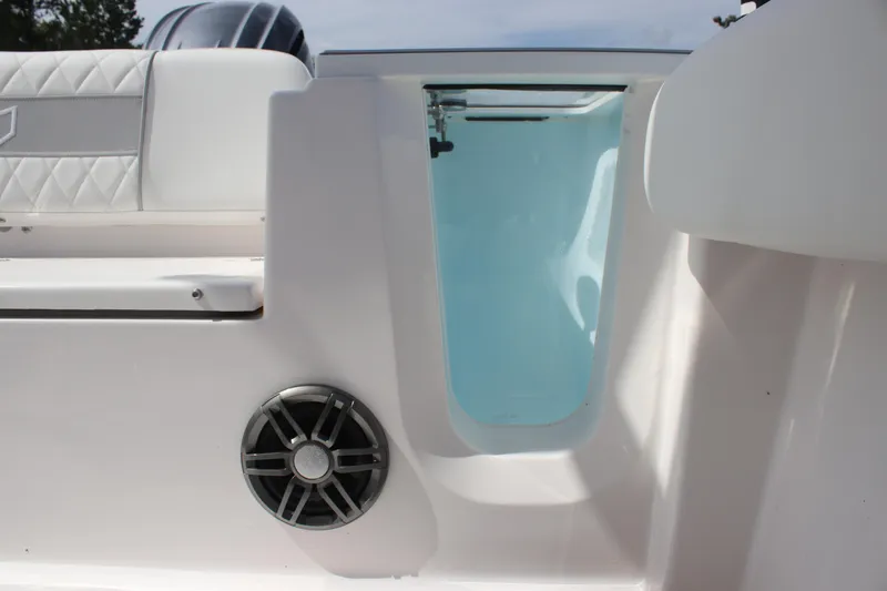 Slide: The Image of 2026 Sea Fox 228 Commander boat interior with speaker and storage compartment. - 28