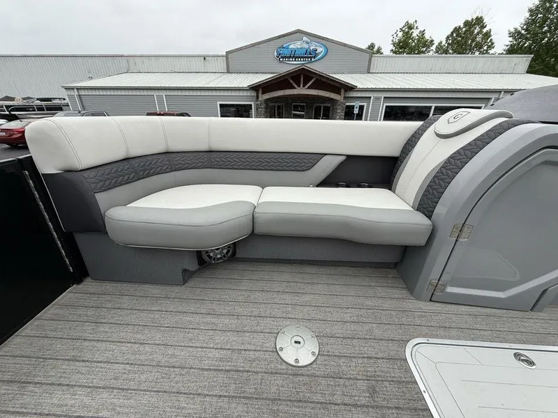 Slide: The Image of Luxury seating on 2021 Godfrey Monaco 235 SFL GTP pontoon boat, featuring elegant design and comfort. - 10