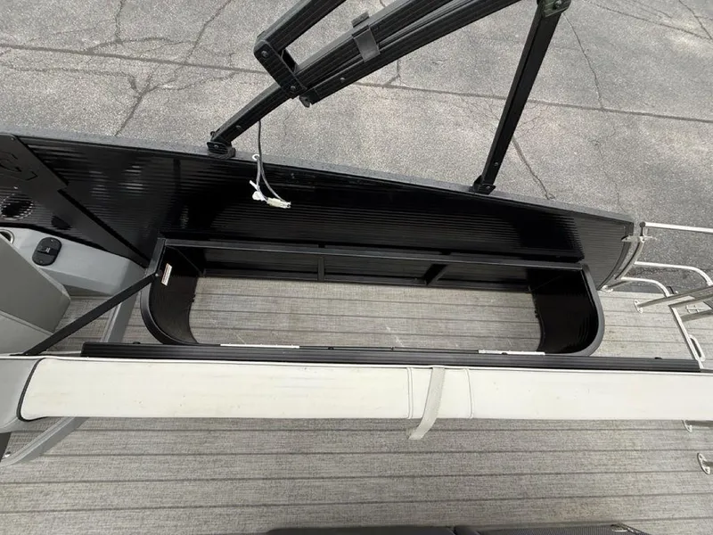 Slide: The Image of 2021 Godfrey Monaco 235 SFL GTP boat with open storage compartment on deck. - 11