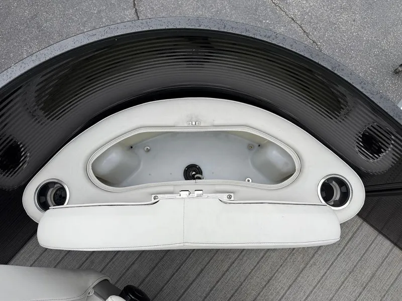 Slide: The Image of Interior of 2021 Godfrey Monaco 235 SFL GTP boat, featuring seating and cup holders. - 18