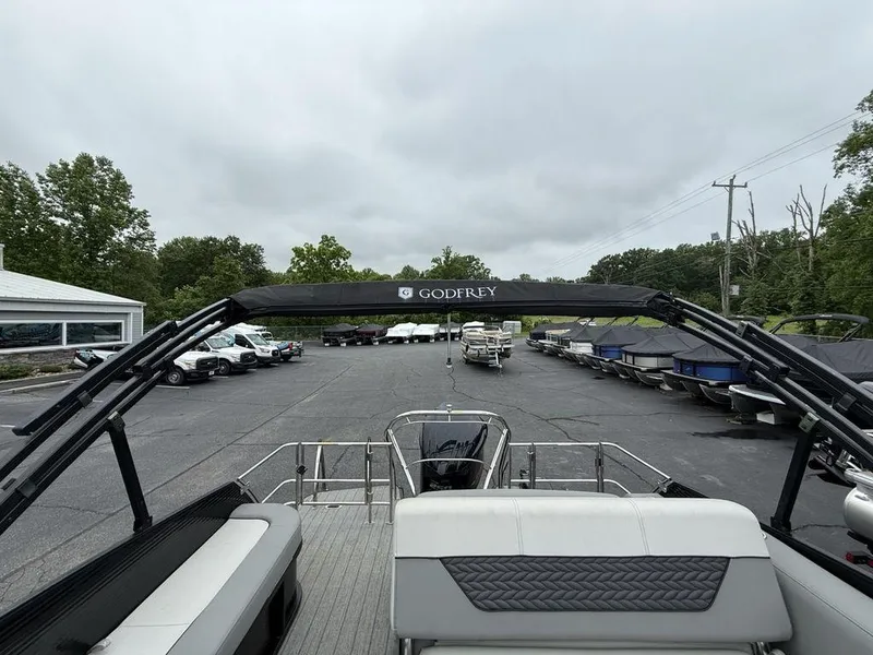 Slide: The Image of 2021 Godfrey Monaco 235 SFL GTP pontoon boat in a dealership lot. - 22