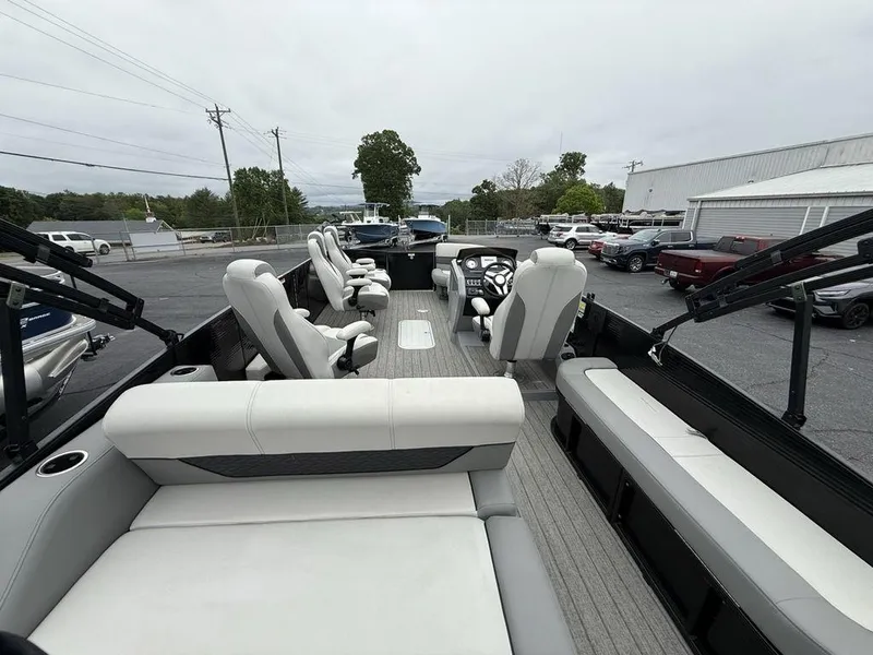 Slide: The Image of 2021 Godfrey Monaco 235 SFL GTP pontoon boat interior with luxurious seating and modern design. - 3