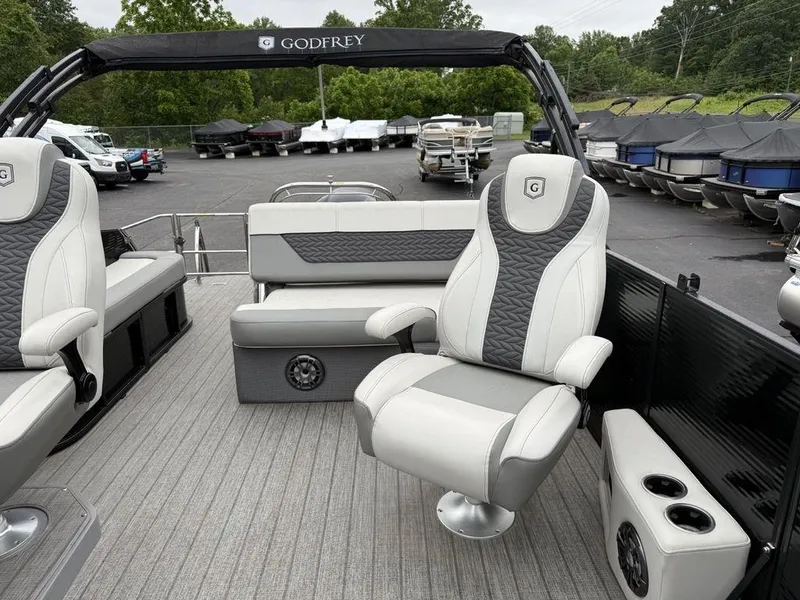 Slide: The Image of Luxurious seating on 2021 Godfrey Monaco 235 SFL GTP pontoon boat, featuring modern design and comfort. - 7
