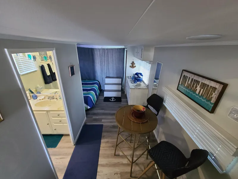 Slide: The Image of 1977 Stardust Cruisers houseboat dashboard with Hobbs hour meter and engine notice. - 11