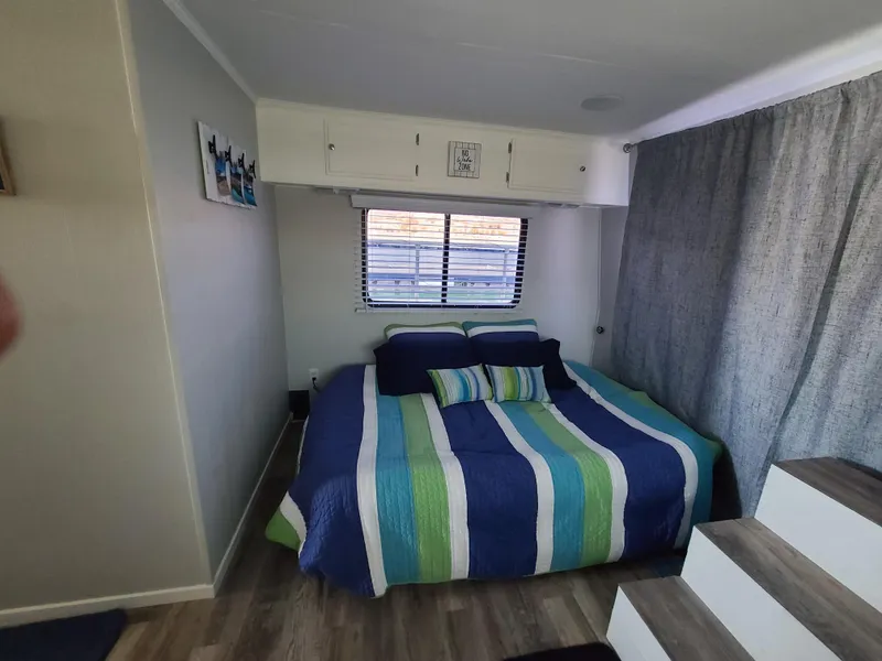 Slide: The Image of Close-up of a 1977 Stardust Cruisers houseboat dashboard with Hobbs hour meter. - 12