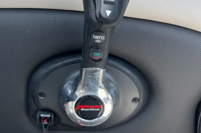 Slide: The Image of Throttle control of 2022 Crownline 280 SS boat with Mercury SmartCraft system. - 11