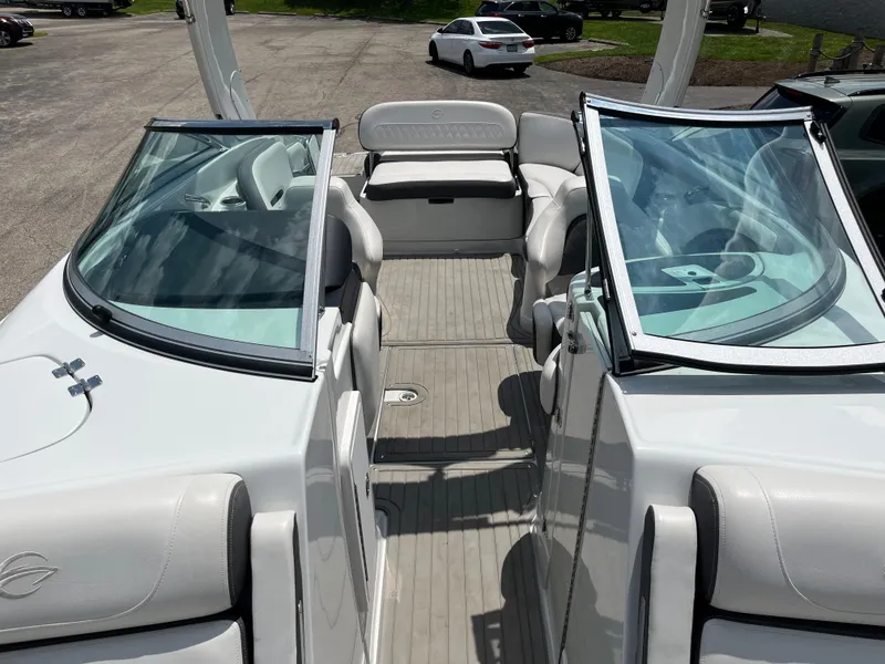 Slide: The Image of 2022 Crownline 280 SS boat interior with open cockpit and seating. - 7