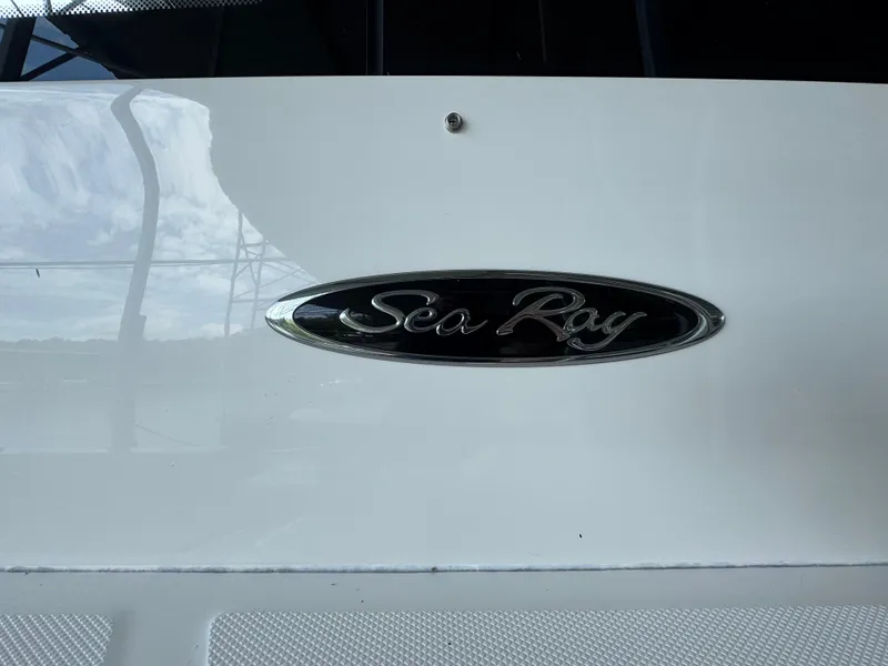 Slide: The Image of Sea Ray Sundancer 400 emblem on a 2017 model yacht, close-up view. - 14