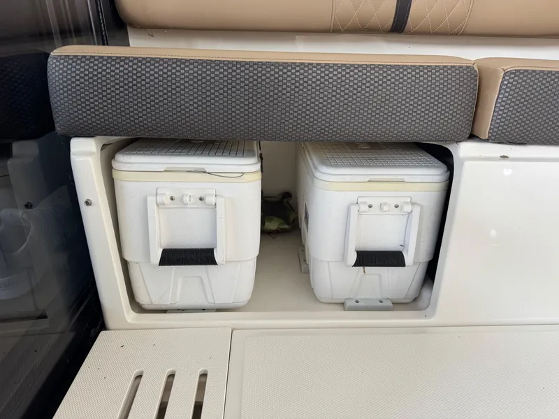 Slide: The Image of Storage compartment with coolers on a 2017 Sea Ray Sundancer 400 boat. - 30