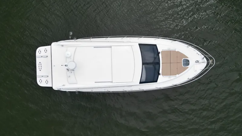 Slide: The Image of Aerial view of 2017 Sea Ray Sundancer 400 yacht on water. - 9