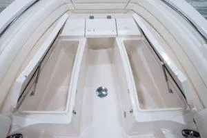 Slide: The Image of 2026 Grady-White Fisherman 236 boat console with steering wheel and controls. - 10