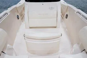 Slide: The Image of 2026 Grady-White Fisherman 236 boat interior at a boat show display. - 7