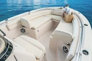 Slide: The Image of 2026 Grady-White Fisherman 236 boat with Yamaha outboard engines at a showroom. - 9