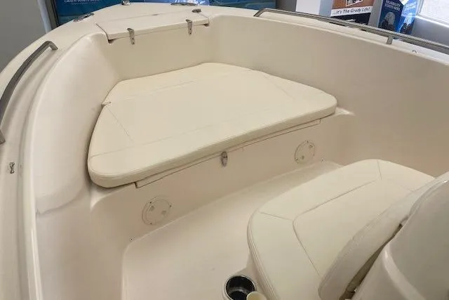 Slide: The Image of 2026 Grady-White Fisherman 180 boat interior with cushioned seating area. - 4