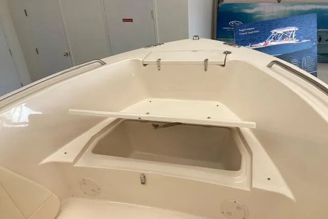 Slide: The Image of 2026 Grady-White Fisherman 180 boat interior with storage compartment open. - 6