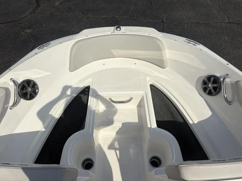 Slide: The Image of Bow seating area of 2021 Sea Ray SPX 190 boat with speakers and cup holders. - 5