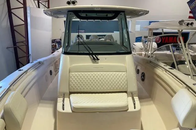 Slide: The Image of 2026 Grady-White Canyon 336 boat with sleek design and comfortable seating. - 10