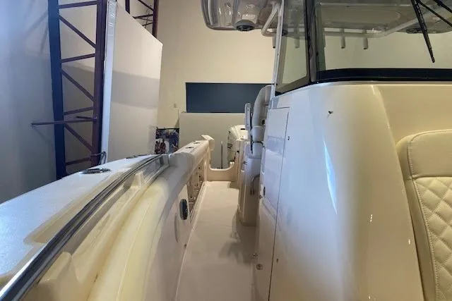 Slide: The Image of 2026 Grady-White Canyon 336 boat interior, showcasing sleek design and modern features. - 11
