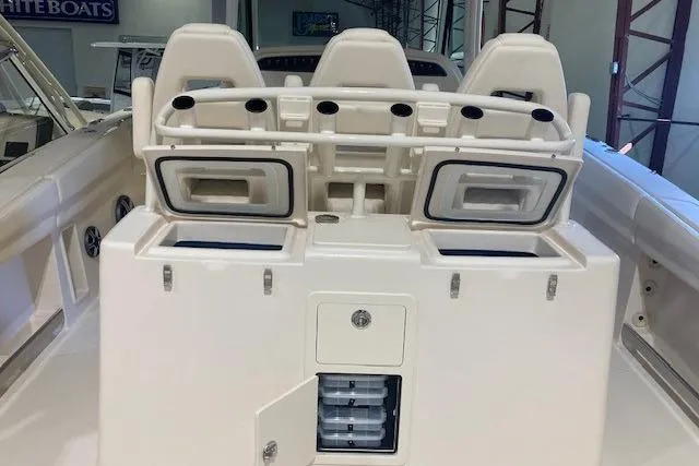 Slide: The Image of 2026 Grady-White Canyon 336 boat interior with seating and storage compartments. - 25