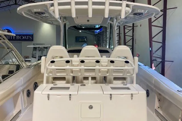 Slide: The Image of 2026 Grady-White Canyon 336 boat interior with seating and storage compartments. - 6