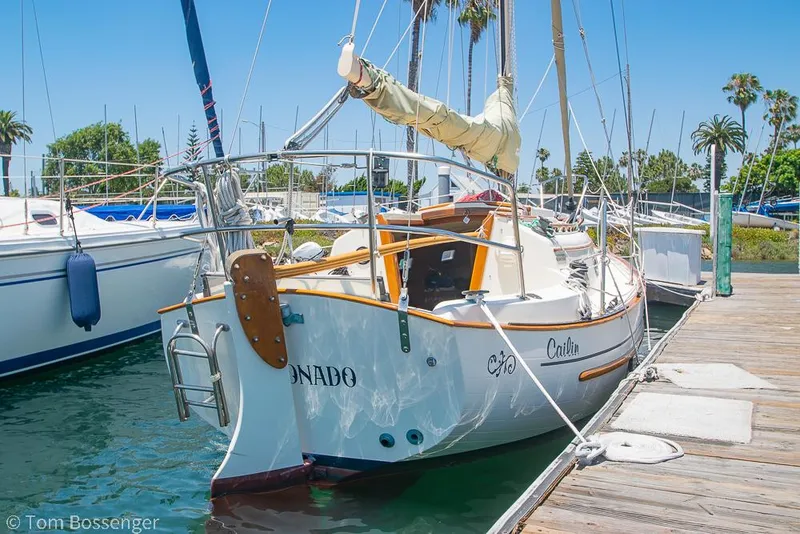 Slide: The Image of Sailboat docked at marina, 1993 Pacific Seacraft Flicka 20, sunny day, palm trees in background. - 2